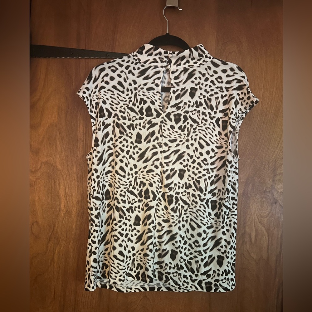 Blouse by Tahari roughed on the shoulder and buttons in front